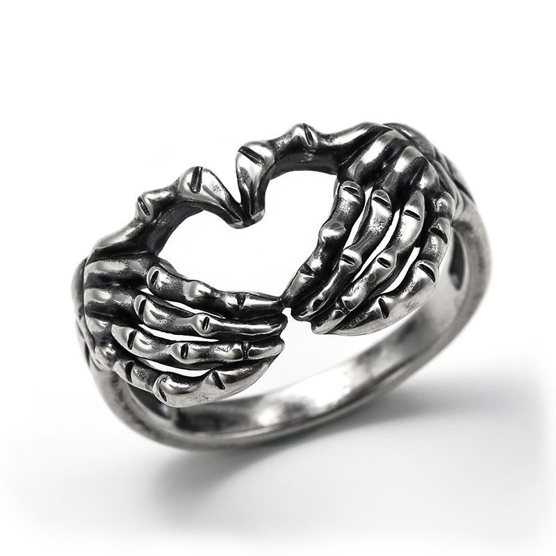 Skull Hand With Heart-Shaped Ring