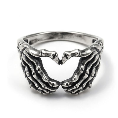 Skull Hand With Heart-Shaped Ring
